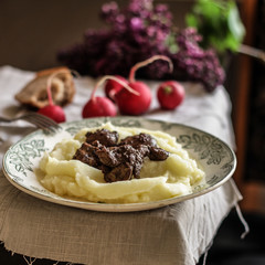Mashed potatoes with the liver on the table. second course.