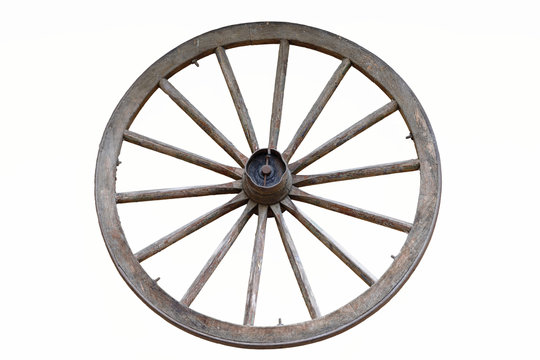 isolated wooden farm wagon wheel