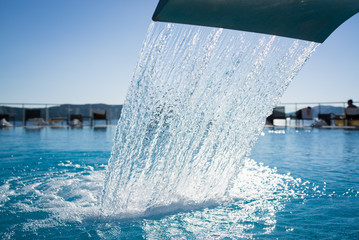 Waterfall jet at the swimming pool