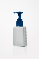 Plastic bottle of the colored transparent liquid lotion