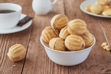 Cookies nuts with cream  and coffee