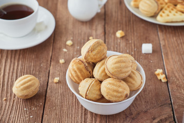 Cookies nuts with cream  and coffee