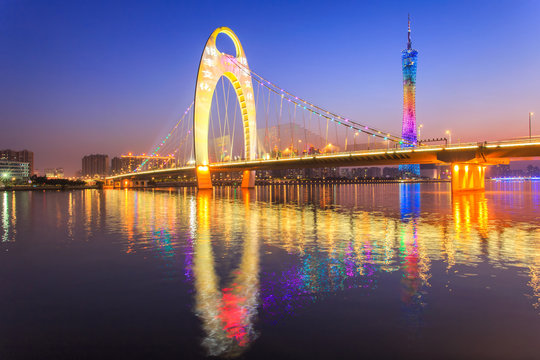 River with modern city landmark architecture backgrounds of pink clouds in Guangzhou China ,Zhujiang River and modern building of financial district in guangzhou china 