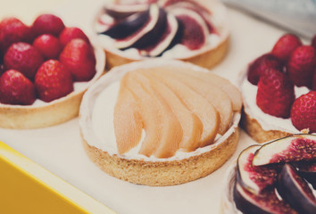 Closeup of pear tart dessert tray assorted