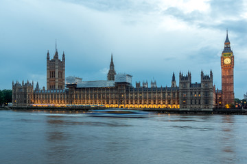 Fototapeta na wymiar LONDON, ENGLAND - JUNE 16 2016: Sunset view of Houses of Parliament, Westminster palace, London, England, Great Britain