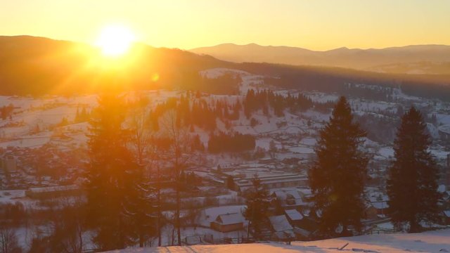 Timelapse sunset winter village mountain