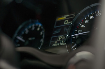 Speedometer and tachometer in the new car.