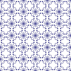 Abstract floral seamless pattern on blue and white.