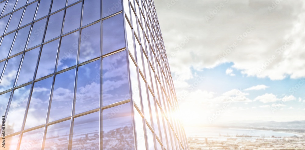 Poster composite image of reflection of sky on modern building