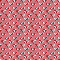 Red and white hand drawn seamless pattern heart on pink background.