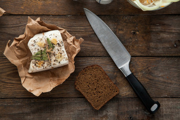 Ukrainian pork lard prepared for lunch with bread and pickle. Tasty, high calorie meal for people who is not on diet.