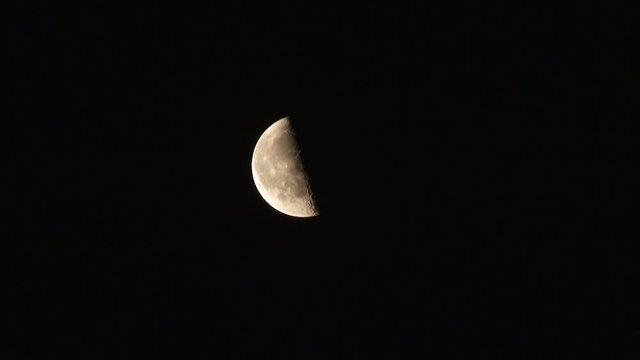 Moon in the black night sky