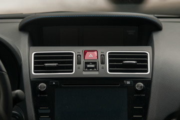 Obraz na płótnie Canvas Display, climate control and air vents in the car.
