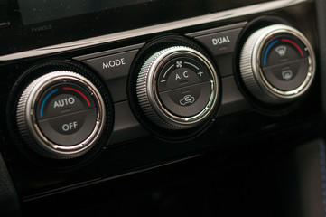 Fototapeta premium Climate control unit in the new car.