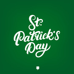 St. Patrick's Day hand written lettering on green background.