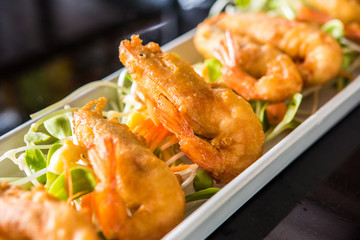 fried shrimp on plate for served in a restaurant