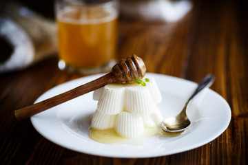 sweet dessert panna cotta with honey