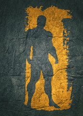 Bodybuilder silhouette. Muscular man posing. Sketch style illustration. Grunge brush stroke. Concrete textured.
