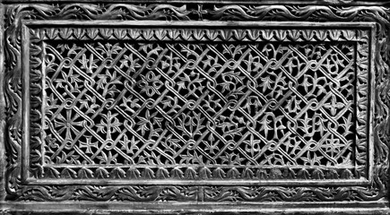 Bas-relief in the form of floral ornament on a stone