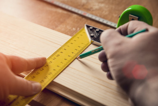 Measuring the wooden board