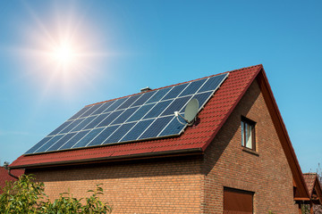 Solar panel on a red roof