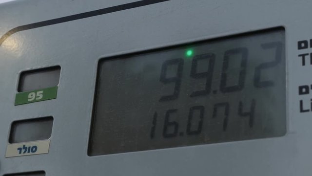 Close up rising gas price on led screen at gas station, Israel. 95 octane fuel, diesel fuel.