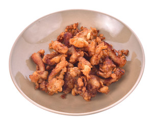 fried pork with garlic and pepper,thaifood isolated on white background