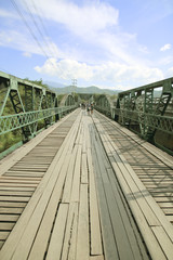 Fototapeta na wymiar The tourist walking on the bridge in Pai district was built during World War 2 at northern of Thailand
