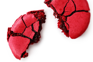 Smashed fresh macaron with soft cream inside, isolated