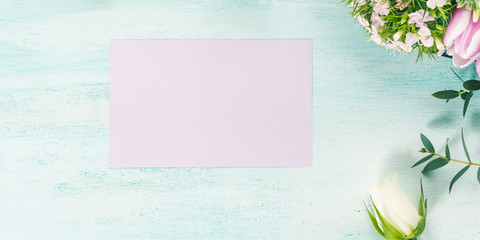 Empty purple card flowers tulips roses spring pastel color background. Easter holiday, wedding birthday invitation banner