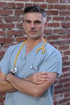 Mature handsome doctor portrait isolated