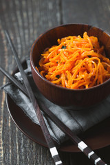 Carrots in Korean with spices and chopsticks