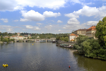 Fototapeta na wymiar Old Town architecture and Charles Bridge over Vltava river in Prague