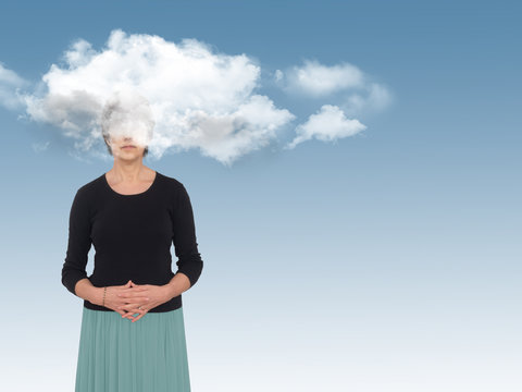 Woman with head in the clouds, daydreaming or creativity concept