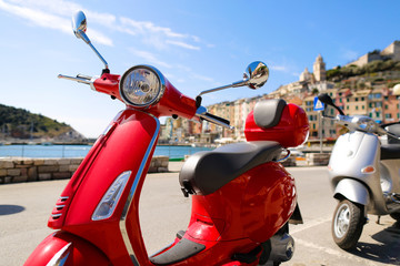 Red Vespa in the city