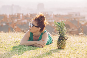 crazy woman with funny pineapple with glasses