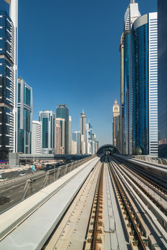 Subway line among modern skyscrapers