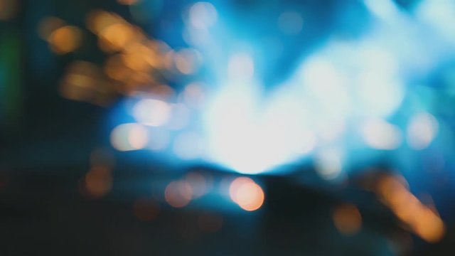 Blurred background of Metal Welding with sparks and smoke in manufacturing