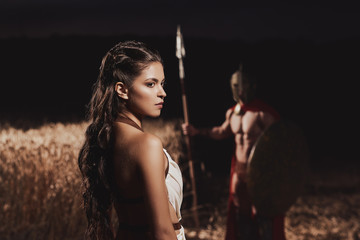 Warrior meeting his wife before war at field.