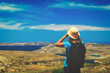 young tourist hiking in mountains