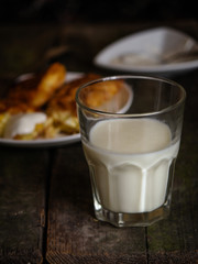 a glass of milk (yogurt) on the table