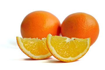 Closeup of oranges on a white background
