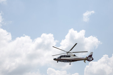 Fototapeta na wymiar The helicopter in the sky.