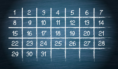 Monthly Calendar with 31 days on blue chalkboard background