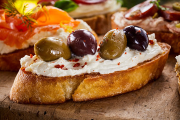 Canape with black and green olives