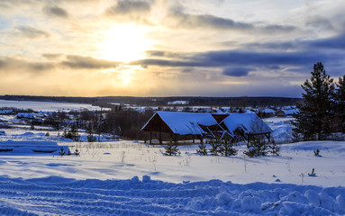 Snow house in winter dreamland at dawn in forest old weather and lot of snow on roof