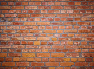 Old red brick wall for background