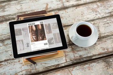 Composite image of overhead of tablet on desk
