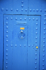antique door in morocco africa blue  rusty