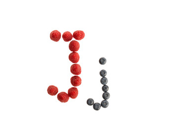 Alphabet from fresh fruit, raspberry and blackberry